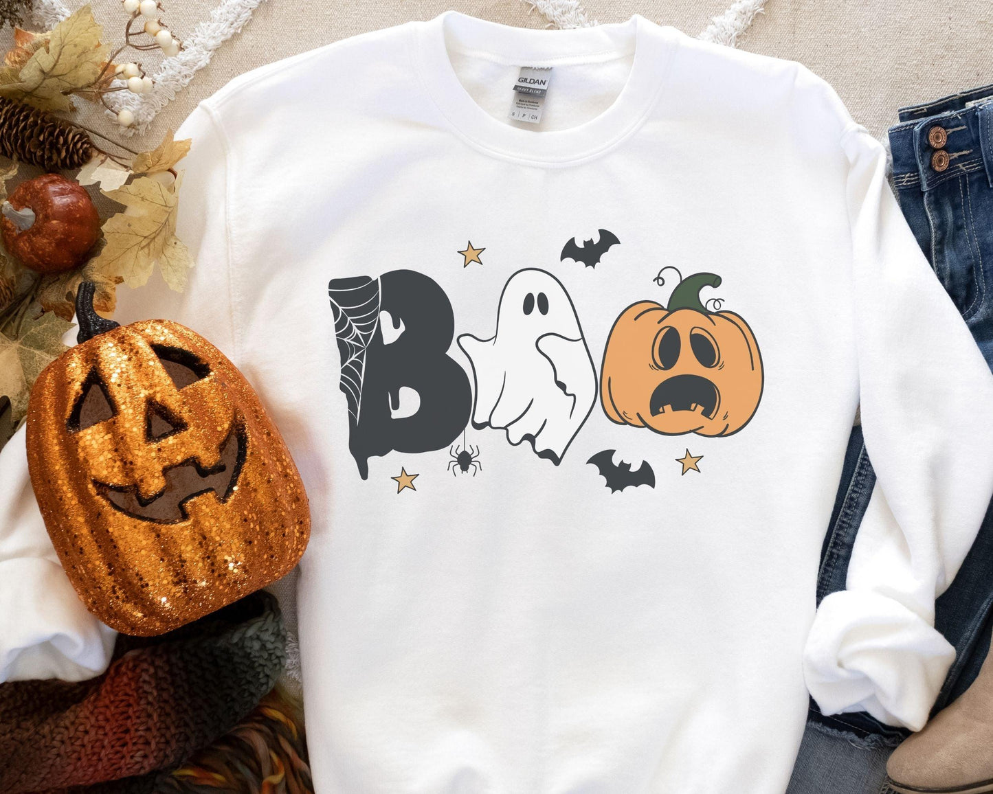 Get into the Halloween spirit with our bewitching Halloween sweatshirt, featuring spooky pumpkin and ghost designs that capture the essence of the season. Embrace the autumn vibes and celebrate the fall festivities in style with this must-have addition to your wardrobe. Perfect for Halloween enthusiasts, this sweatshirt will keep you cozy and fashionable all season long!
