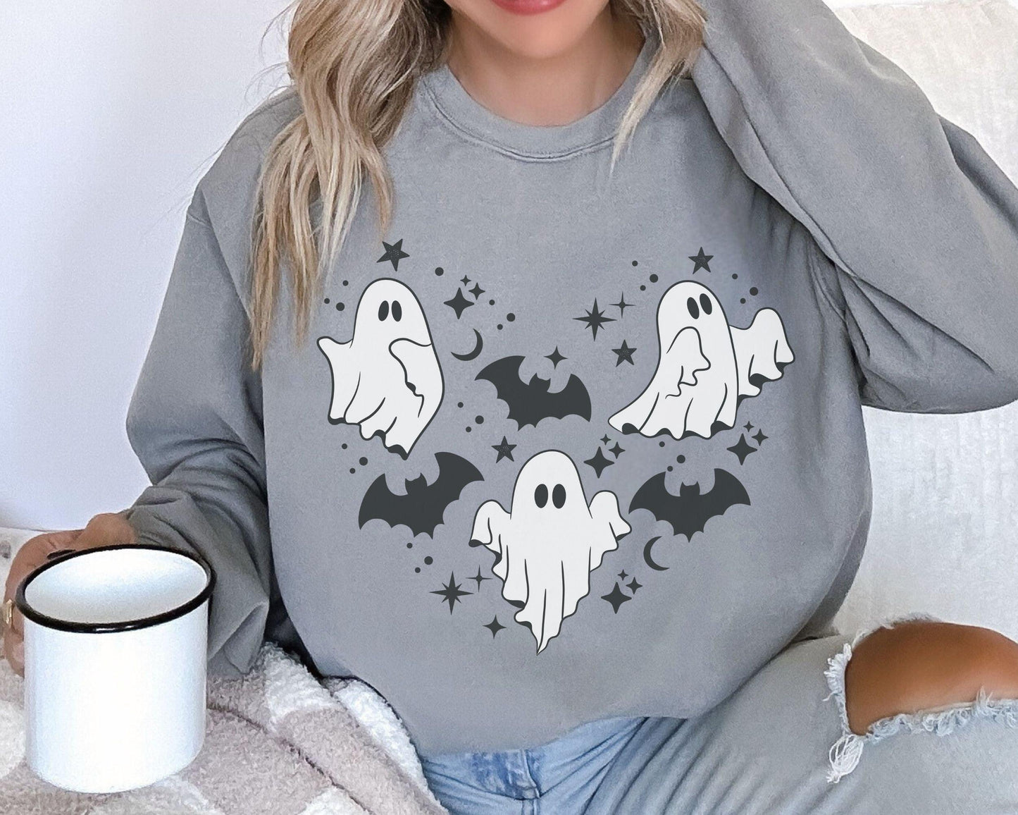 Get into the Halloween spirit with our bewitching Halloween sweatshirt, featuring spooky pumpkin and ghost designs that capture the essence of the season. Embrace the autumn vibes and celebrate the fall festivities in style with this must-have addition to your wardrobe. Perfect for Halloween enthusiasts, this sweatshirt will keep you cozy and fashionable all season long!
