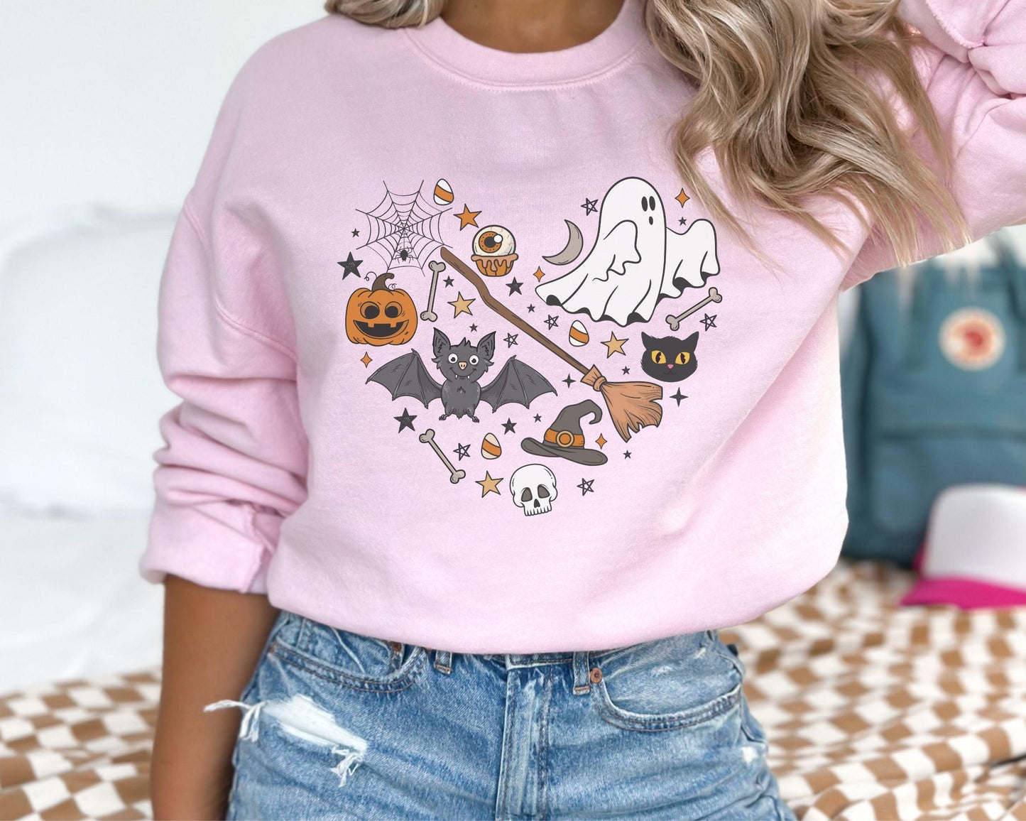 Get into the Halloween spirit with our bewitching Halloween sweatshirt, featuring spooky pumpkin and ghost designs that capture the essence of the season. Embrace the autumn vibes and celebrate the fall festivities in style with this must-have addition to your wardrobe. Perfect for Halloween enthusiasts, this sweatshirt will keep you cozy and fashionable all season long!