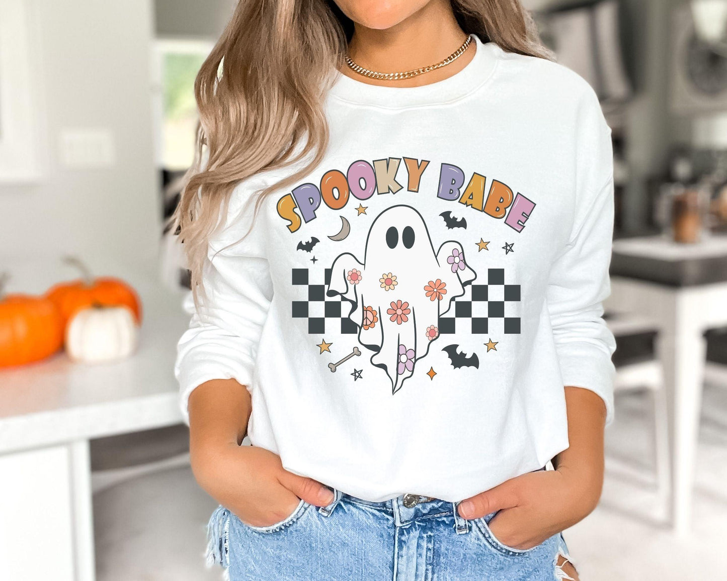 Get into the Halloween spirit with our bewitching Halloween sweatshirt, featuring spooky pumpkin and ghost designs that capture the essence of the season. Embrace the autumn vibes and celebrate the fall festivities in style with this must-have addition to your wardrobe. Perfect for Halloween enthusiasts, this sweatshirt will keep you cozy and fashionable all season long!