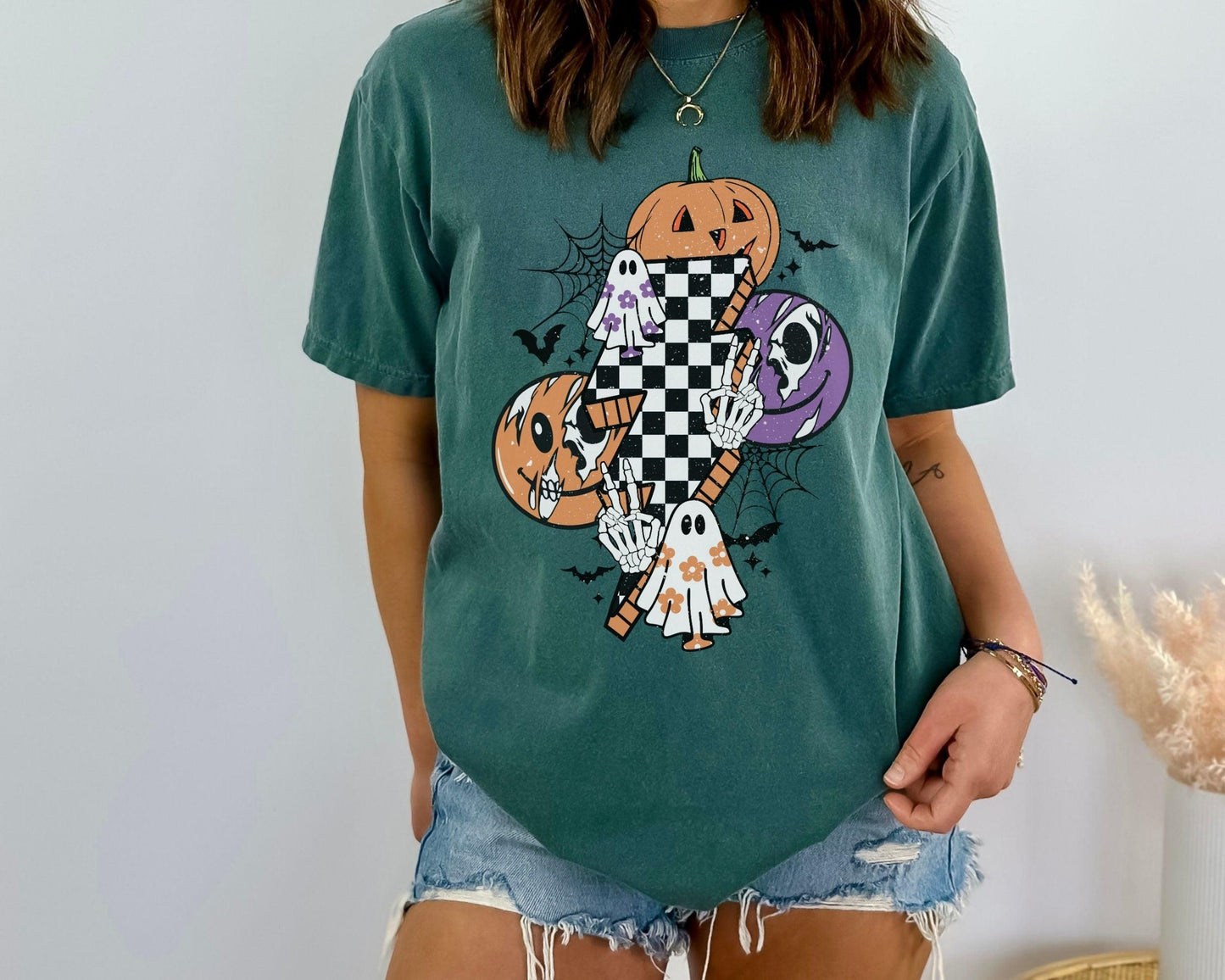 Get into the Halloween spirit with our bewitching Halloween sweatshirt, featuring spooky pumpkin and ghost designs that capture the essence of the season. Embrace the autumn vibes and celebrate the fall festivities in style with this must-have addition to your wardrobe. Perfect for Halloween enthusiasts, this sweatshirt will keep you cozy and fashionable all season long!