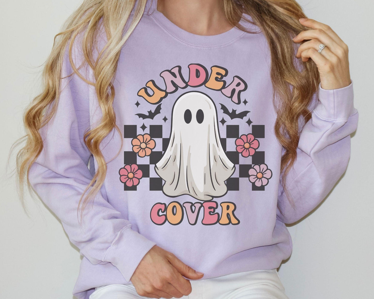 Get into the Halloween spirit with our bewitching Halloween sweatshirt, featuring spooky pumpkin and ghost designs that capture the essence of the season. Embrace the autumn vibes and celebrate the fall festivities in style with this must-have addition to your wardrobe. Perfect for Halloween enthusiasts, this sweatshirt will keep you cozy and fashionable all season long!