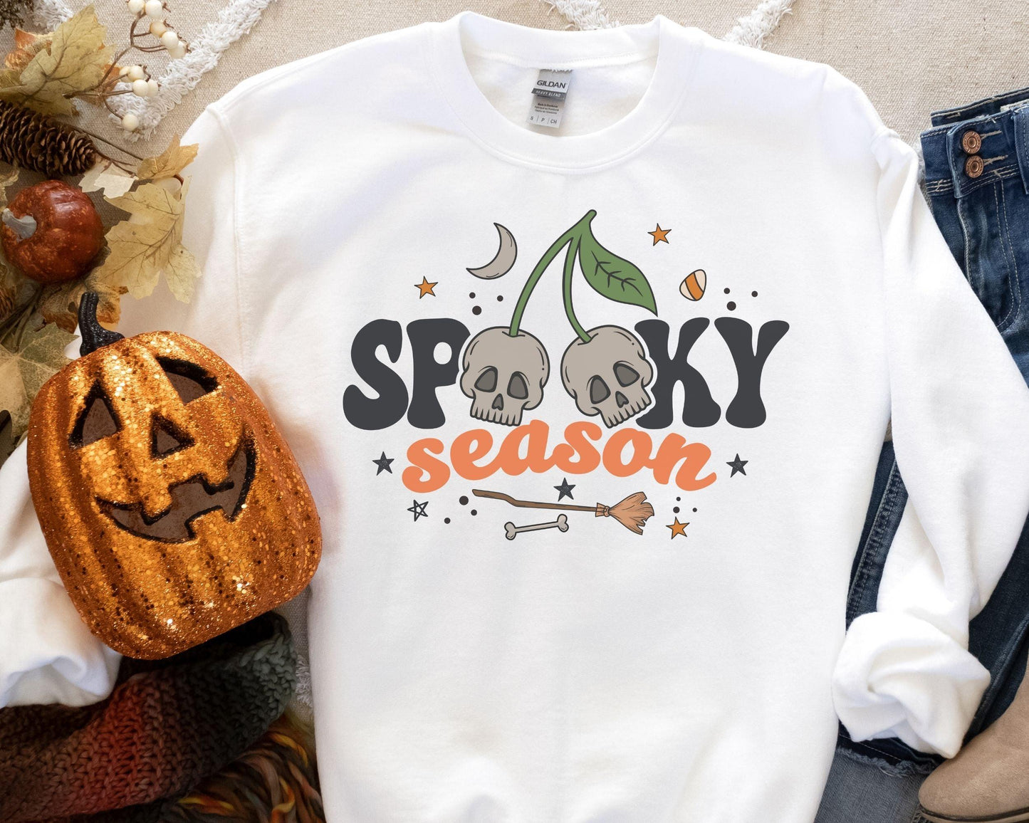 Get into the Halloween spirit with our bewitching Halloween sweatshirt, featuring spooky pumpkin and ghost designs that capture the essence of the season. Embrace the autumn vibes and celebrate the fall festivities in style with this must-have addition to your wardrobe. Perfect for Halloween enthusiasts, this sweatshirt will keep you cozy and fashionable all season long!